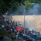 Protesters scramble in Center City, Philadelphia after police launched tear gas at them near a tunnel exit.